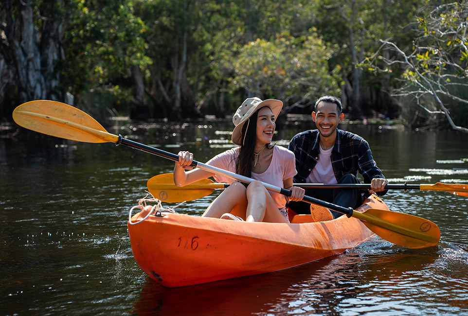 asian-attractive-romantic-young-couple-rowing-kaya-BG973J8